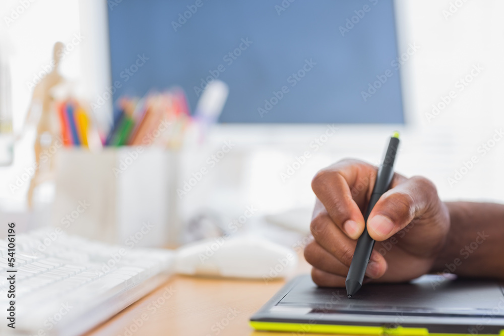 Close up of graphic designer using graphics tablet Close up of graphic designer using graphics tablet