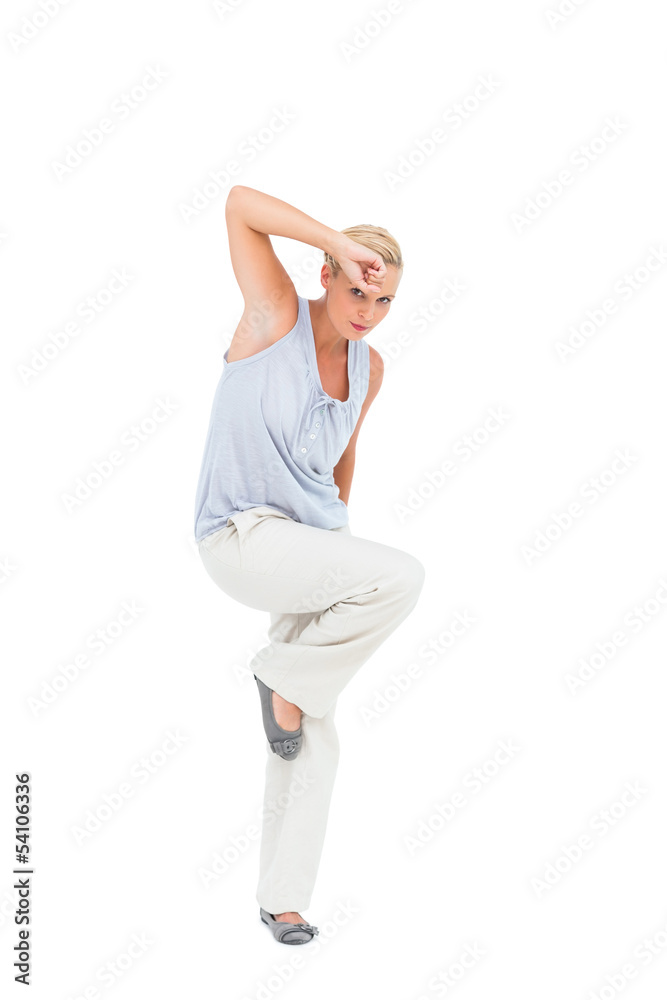 Blonde woman posing and looking at camera Blonde woman posing and looking at camera