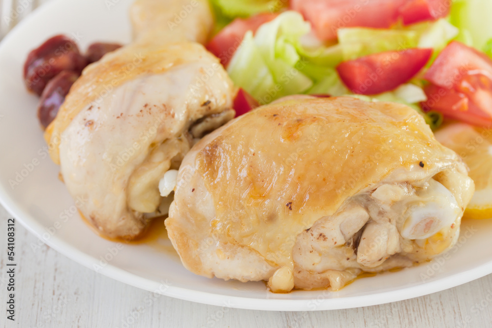 fried chicken with salad on the plate