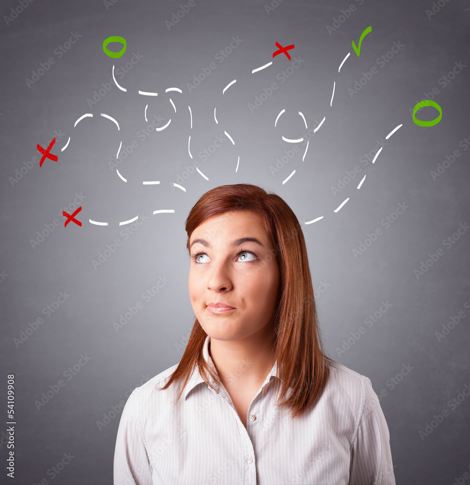 Young woman thinking with abstract marks overhead Young woman thinking with abstract marks overhead