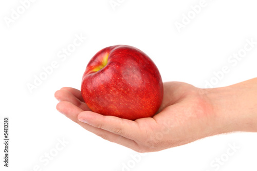 Ripe red apple on hand.