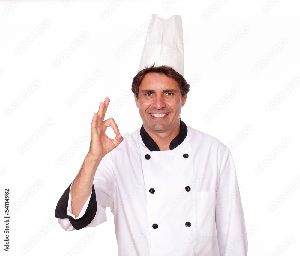 Charismatic male cook gesturing positive sign
