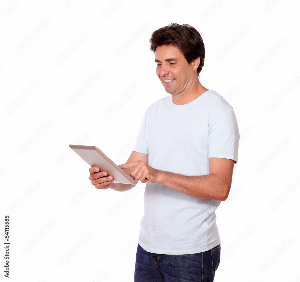 Smiling man working on tablet pc Smiling man working on tablet pc