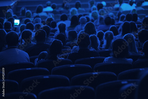 Audience in the cinema. Silhouette.