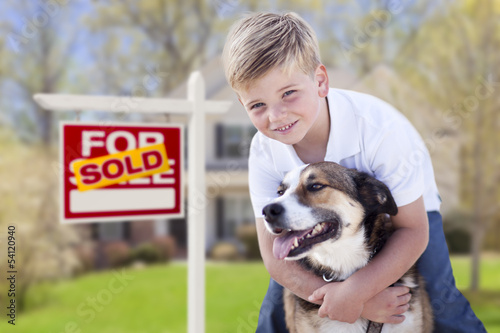 Young Boy and His Dog in Fr...