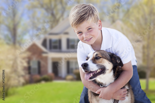 Playful Young Boy Hugs His ...