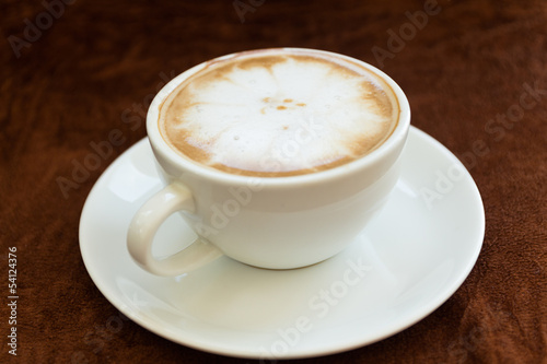 Hot coffee cup on grunge background