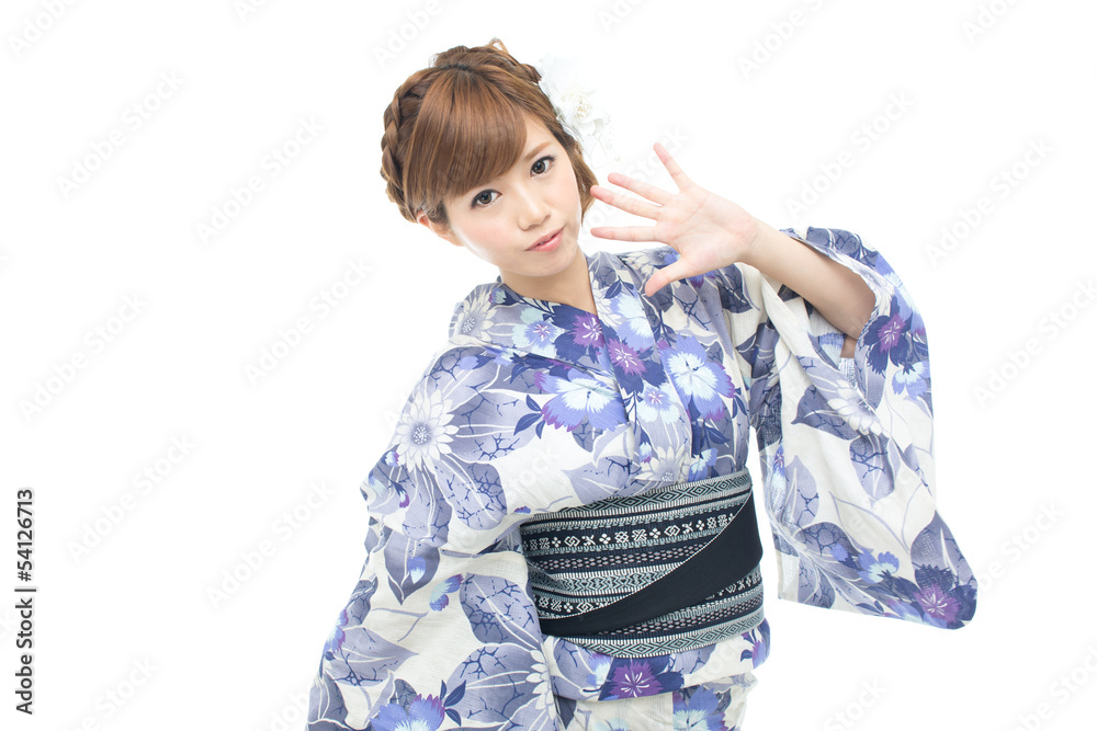 Beautiful young woman wearing japanese traditional kimono Beautiful young woman wearing japanese traditional kimono