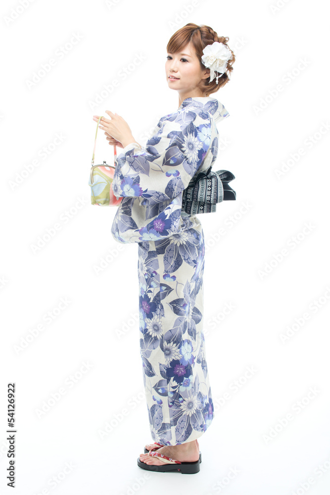 Beautiful young woman wearing japanese traditional kimono Beautiful young woman wearing japanese traditional kimono