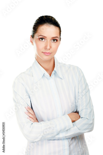 Portrait of beautiful business woman standing with folded arms
