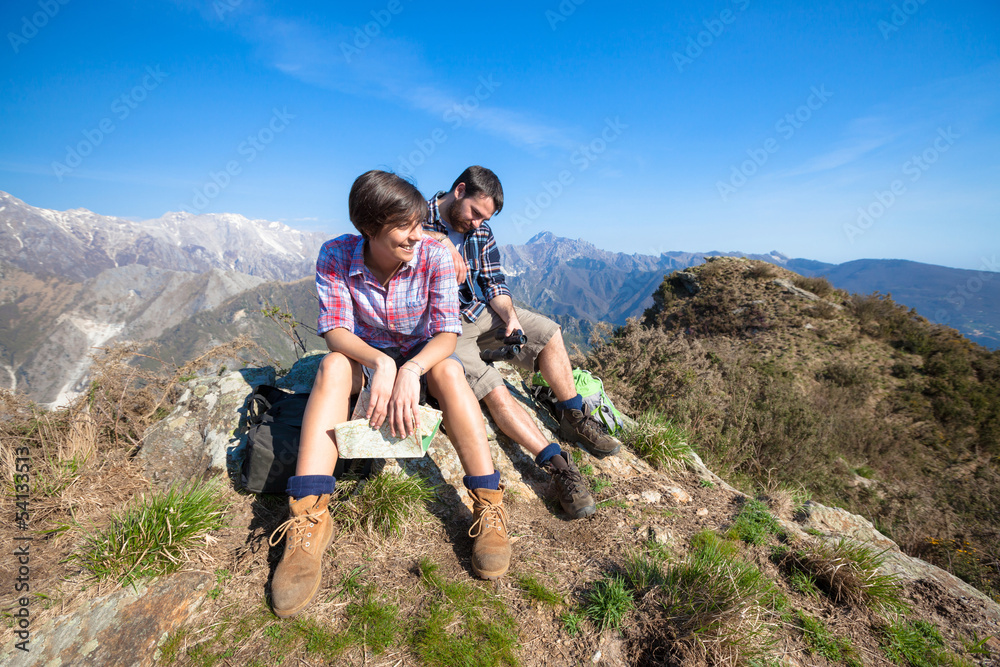 Young Couple at Top of Mountain