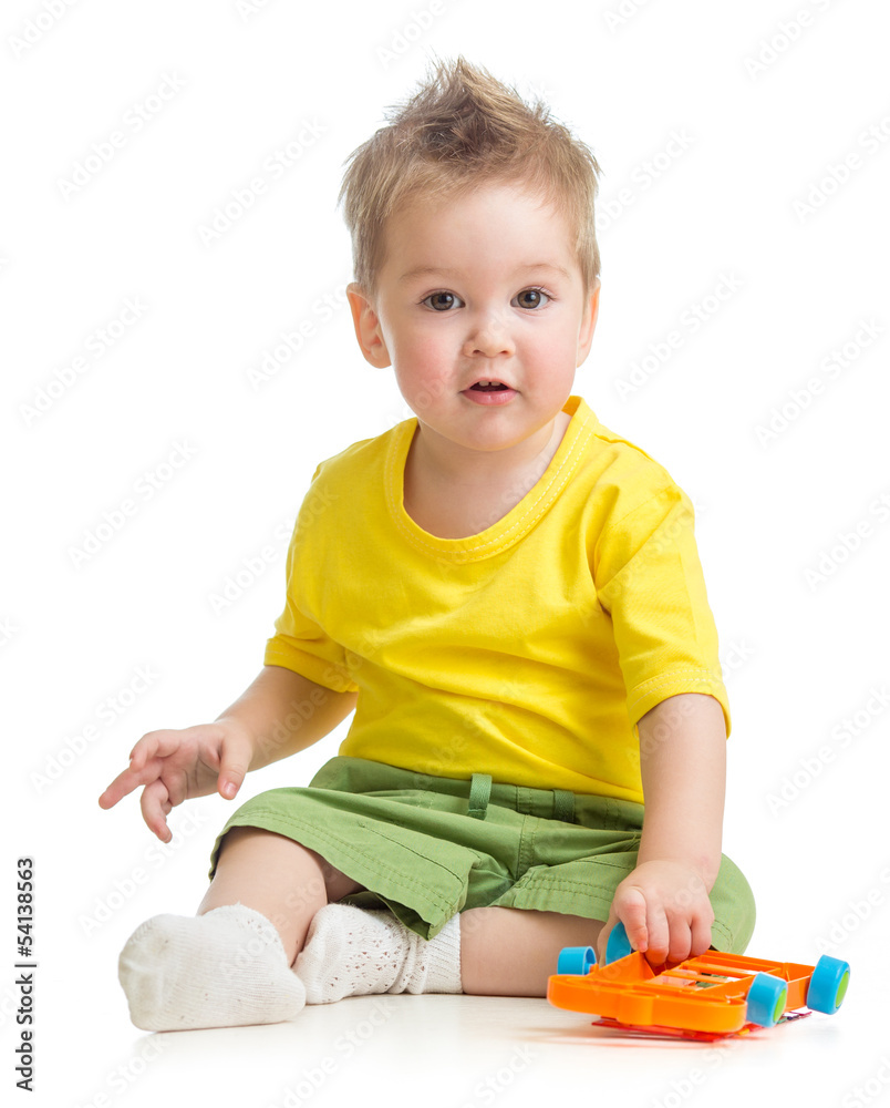 Cute little boy playing car isolated on white Cute little boy playing car isolated on white