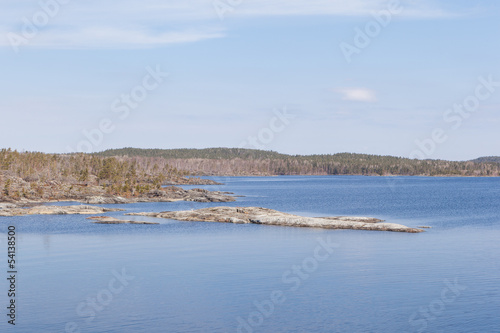 Rocky coast of lake. A landscape