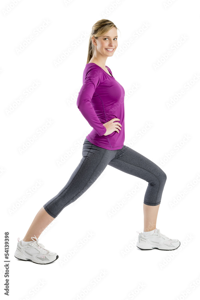 Happy Woman Smiling While Doing Stretching Exercise Happy Woman Smiling While Doing Stretching Exercise