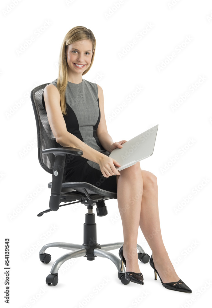 Young Businesswoman With File Sitting On Office Chair Young Businesswoman With File Sitting On Office Chair