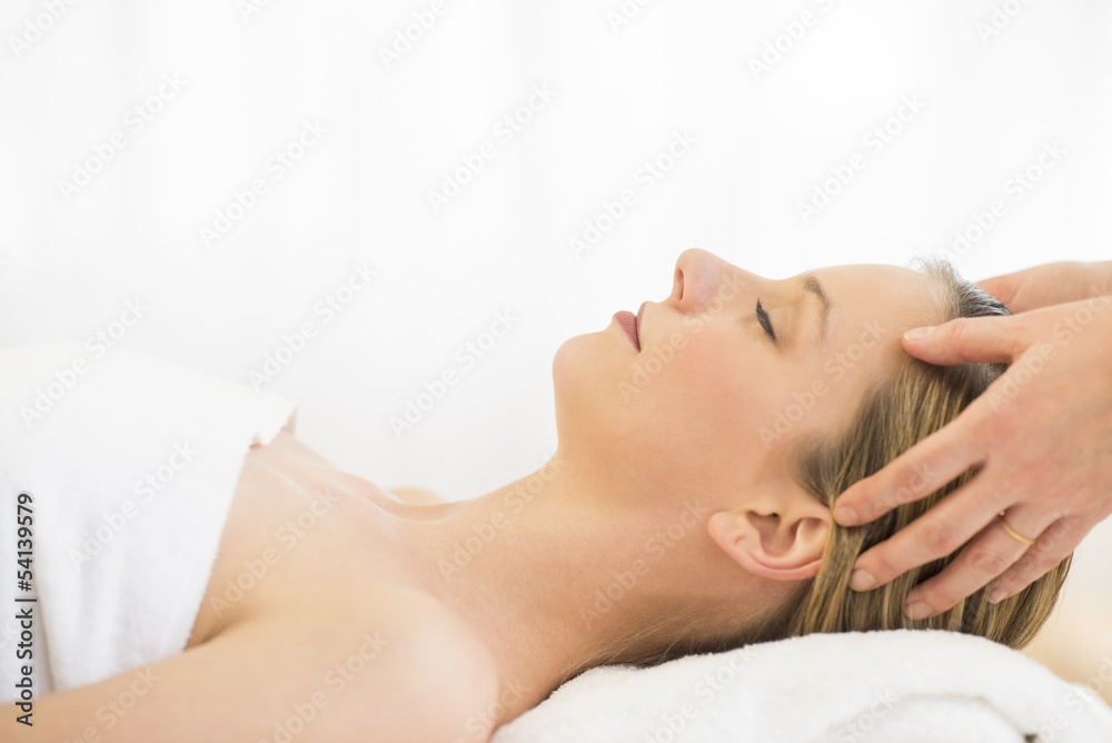 Woman Receiving Head Massage At Health Spa Woman Receiving Head Massage At Health Spa