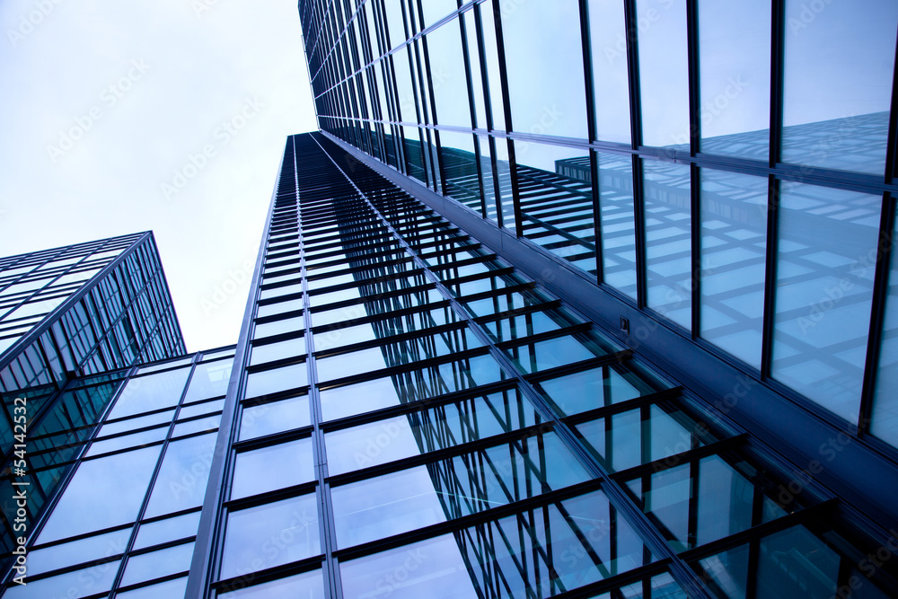 Obraz premium modern blue building of glass and steel