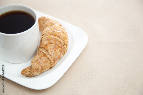 Croissant and a cup of coffee