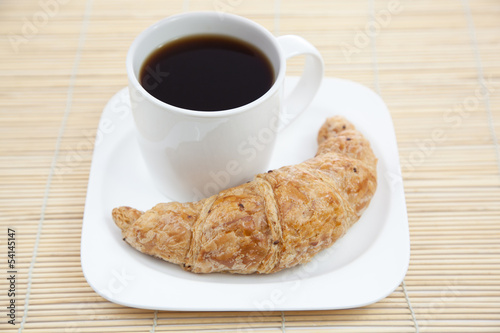 Croissant and a cup of coffee