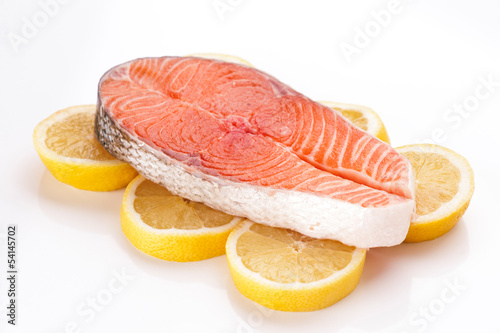 filet of raw salmon on lemons isolated in target