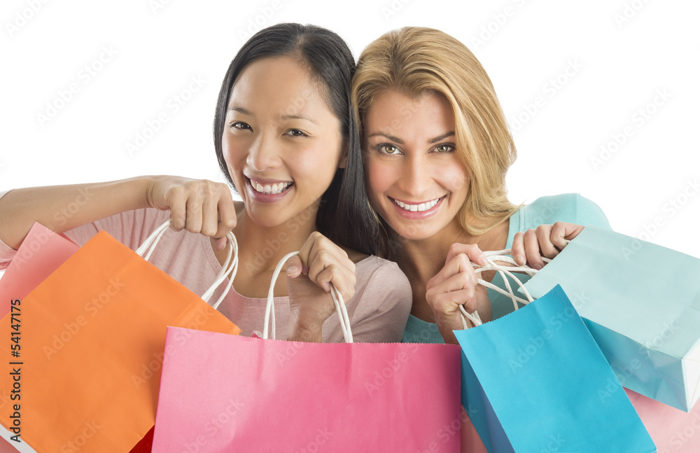 Happy Female Friends Carrying Shopping Bags Happy Female Friends Carrying Shopping Bags
