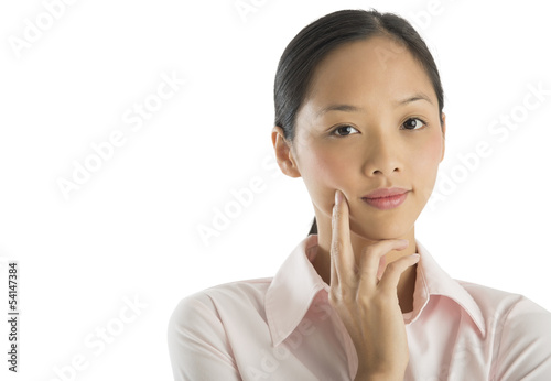 Beautiful Mid Adult Businesswoman With Finger On Cheek