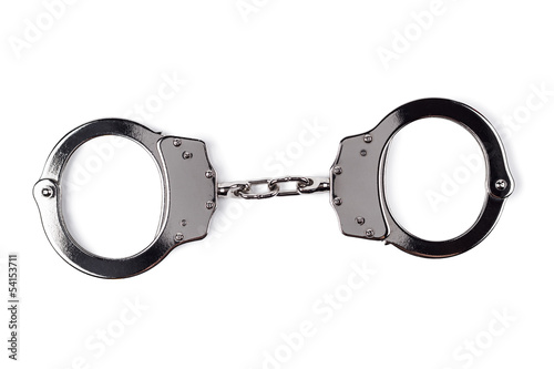 steel handcuffs isolated on the white