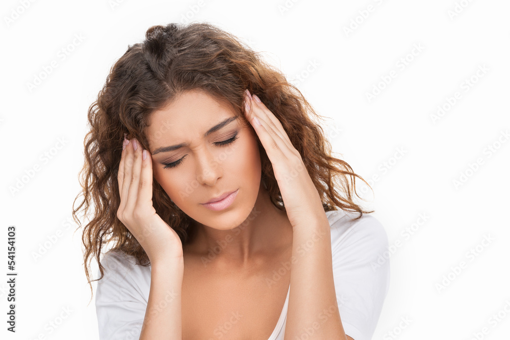 Women with headache. Beautiful young women holding her hands on Women with headache. Beautiful young women holding her hands on