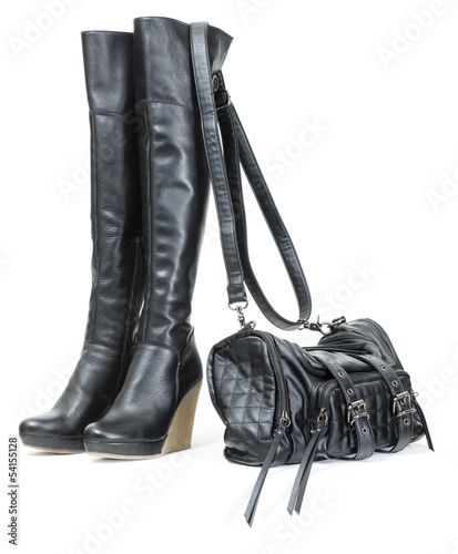 fashionable platform black boots with a handbag