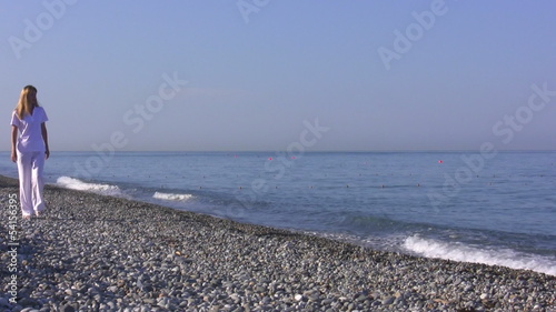 The young woman goes on seaside