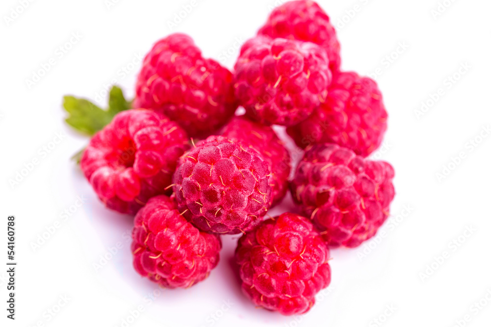 Ripe raspberries isolated on a white Ripe raspberries isolated on a white
