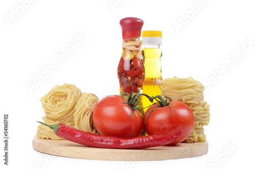 Pasta with an olive oil and tomatoes isolated