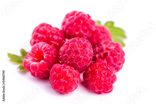 Ripe raspberries isolated on a white