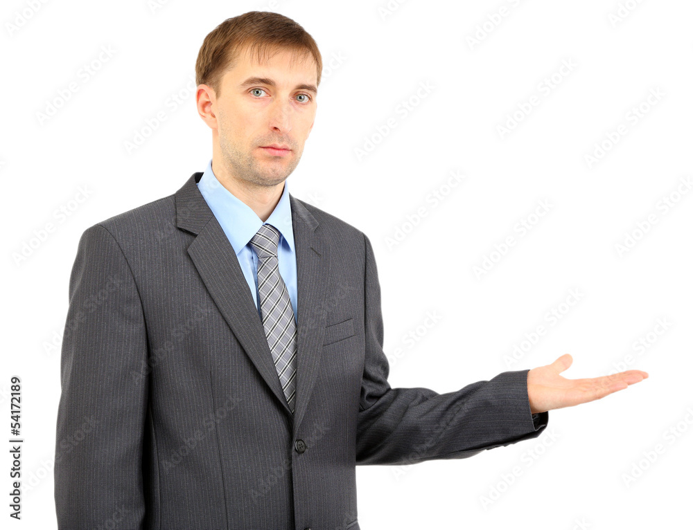 Young businessman presenting showing isolated on white. Young businessman presenting showing isolated on white.