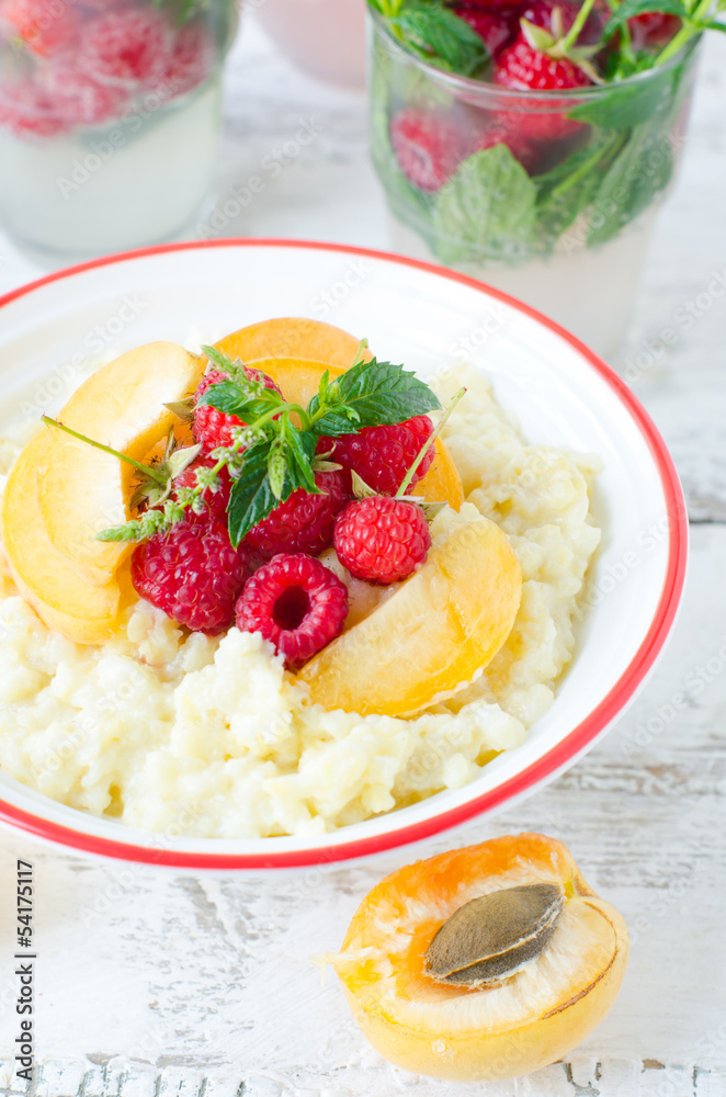 Milk porridge with raspberries and apricots Milk porridge with raspberries and apricots