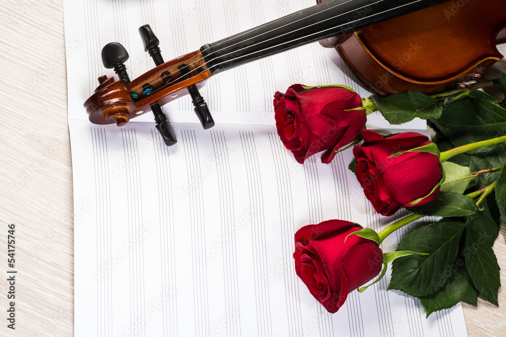 Fototapeta premium Violin, rose and music books