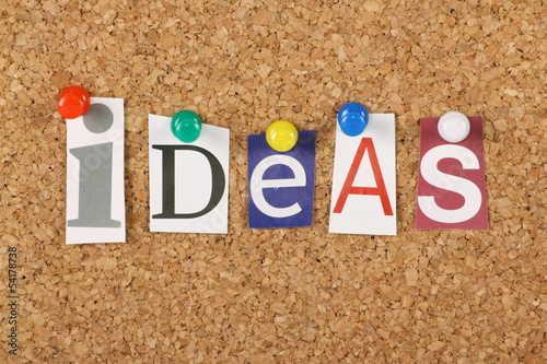 The word Ideas on a cork notice board