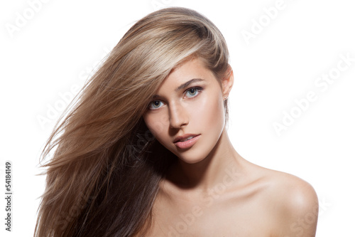 Beautiful Blond Girl. Healthy Long Hair. White Background