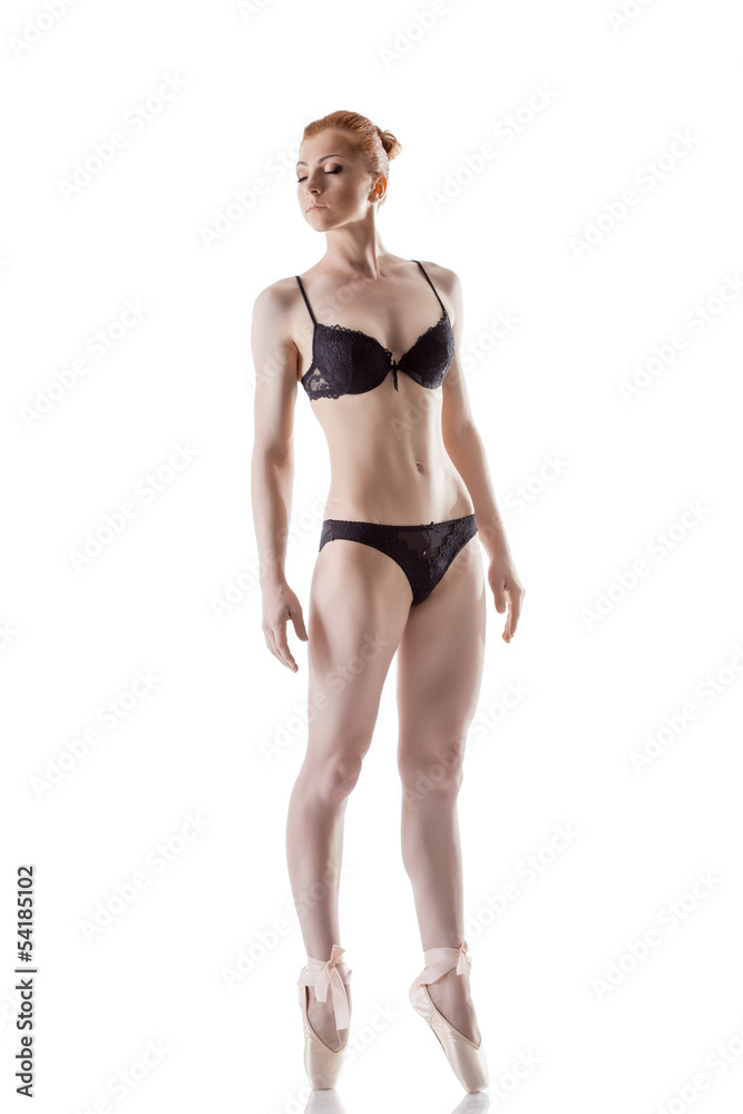 Attractive red-haired ballerina isolated on white Attractive red-haired ballerina isolated on white