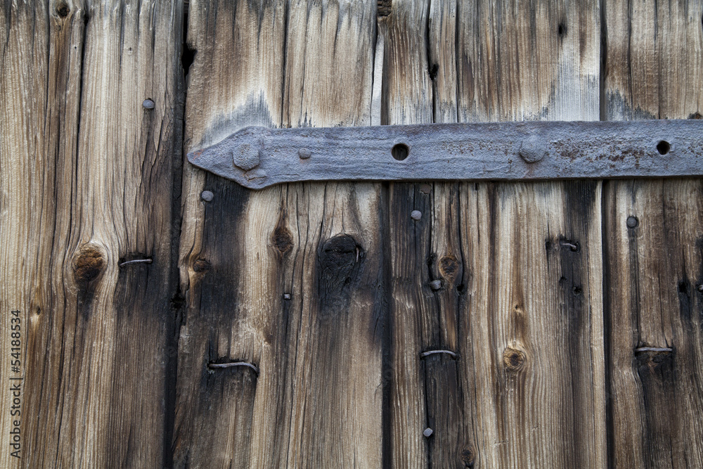Fototapeta premium Metal Parts on Wooden Planks