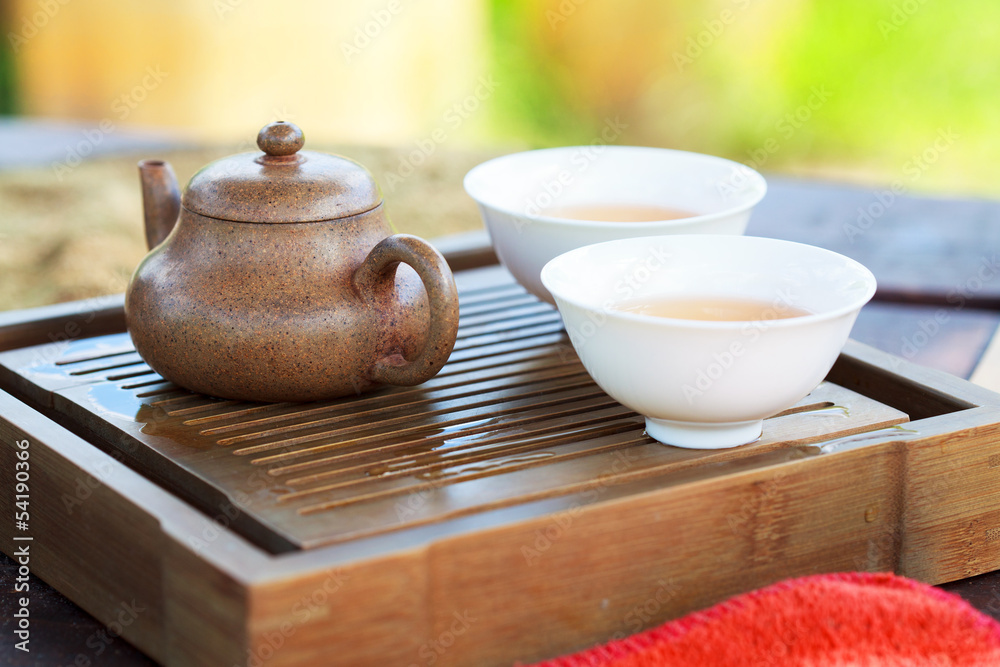 Traditional chinese tea ceremony accessories (tea pot and tea pa Stock  Photo | Adobe Stock