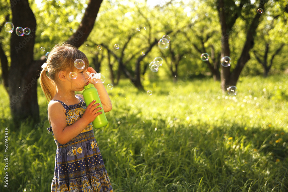 little girl with soap bubbles little girl with soap bubbles