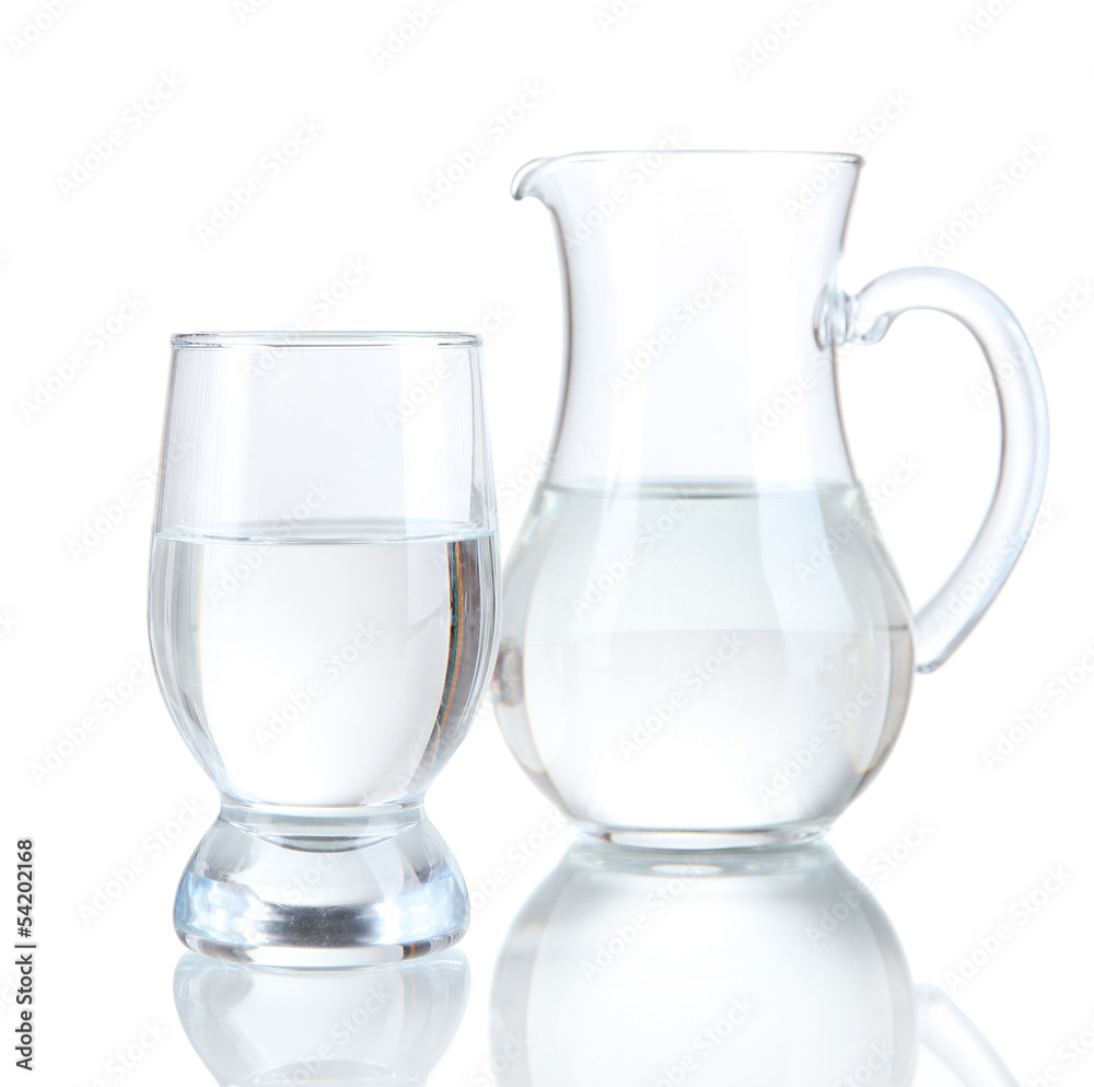 Glass pitcher of water and glass isolated on white Glass pitcher of water and glass isolated on white