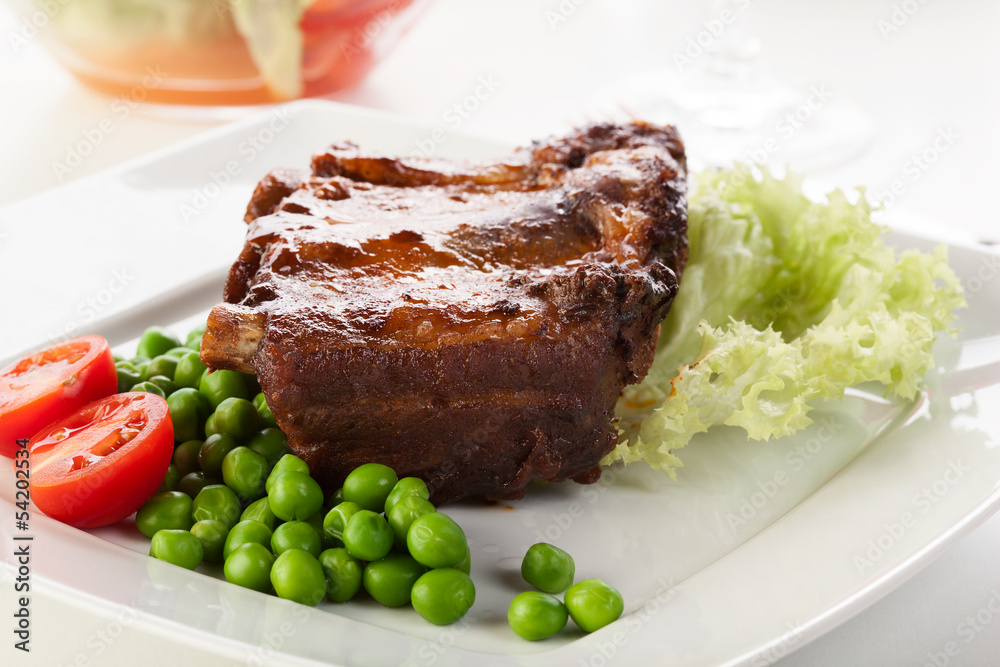 Pork spareribs on plate Pork spareribs on plate