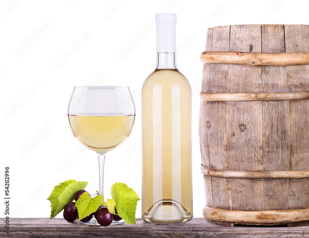 grapes on a barrel and wine glass