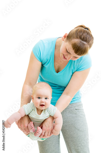 mother doing yoga with baby