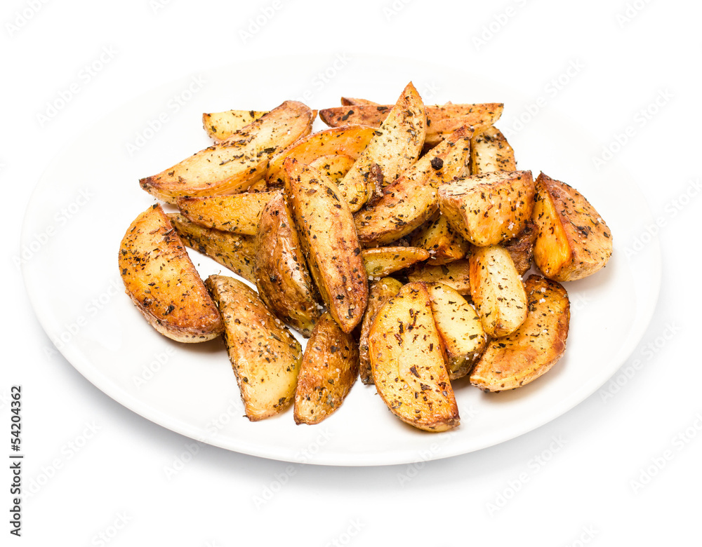 French fries potato wedges in country styled with spices on a pl French fries potato wedges in country styled with spices on a pl