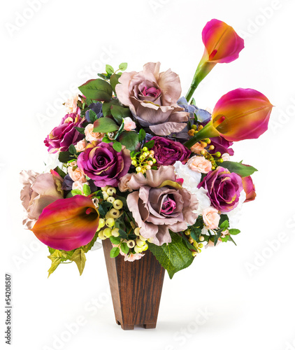 Fototapeta Naklejka Na Ścianę i Meble -  Bouquet of rose and lily in wood bucket