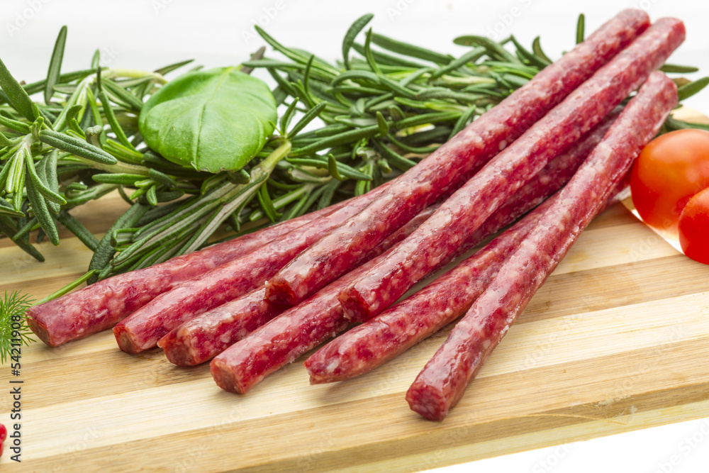 Salami with rosemary, basil and tomato Salami with rosemary, basil and tomato