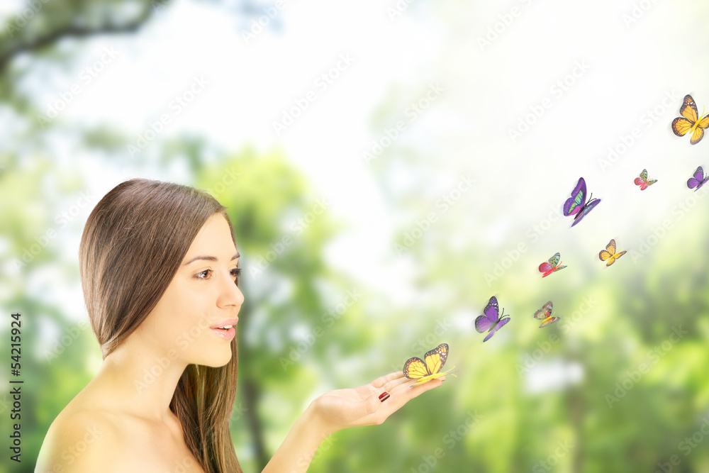 Beautiful young female with many colorful butterflies Beautiful young female with many colorful butterflies